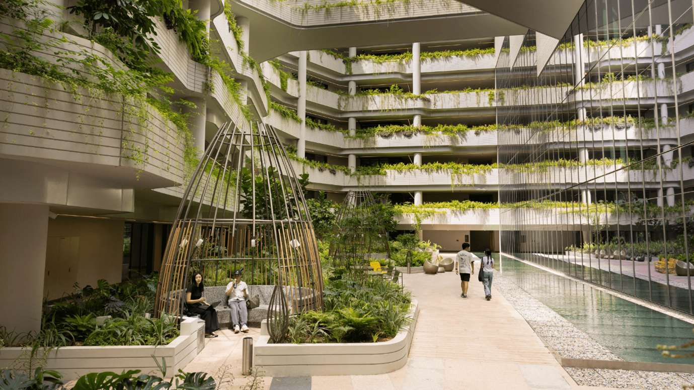 Vertical greenery integrated into the buildings of Punggol Digital District, one of the sustainability features the business park features.